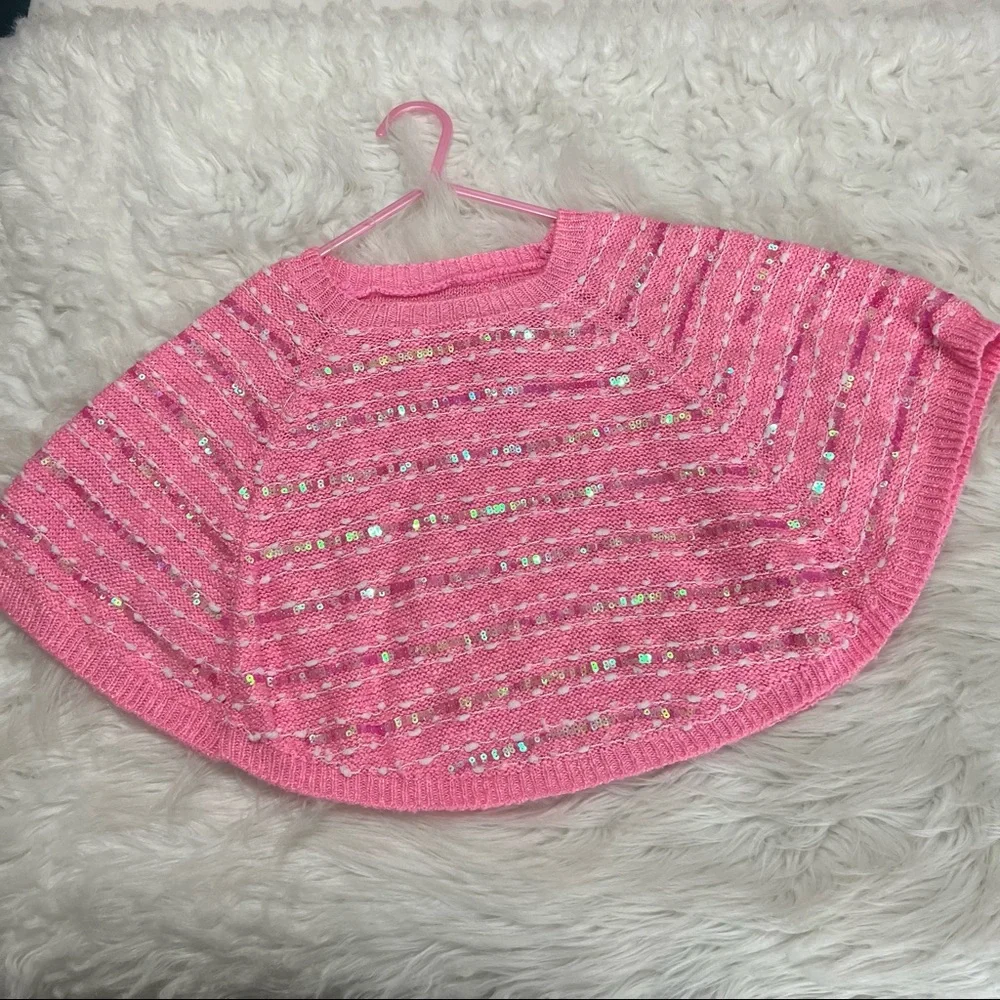 Justice pink sweater poncho with a sleeve iridescent sequins on front size 6/7